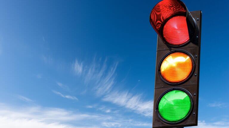 Closeup,Of,A,Traffic,Light,On,A,Blue,Sky,With